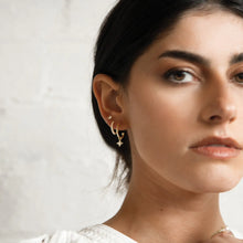 Load image into Gallery viewer, Clover Hoop White Topaz Earrings in Gold by Murkani
