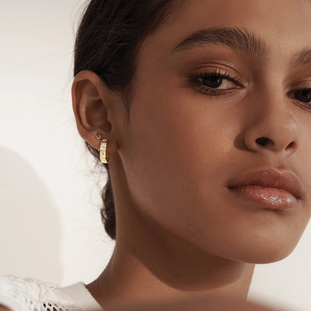Octagonal Huggies White Topaz Earrings in Gold by Murkani
