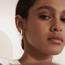 Load image into Gallery viewer, Octagonal Huggies White Topaz Earrings in Gold by Murkani
