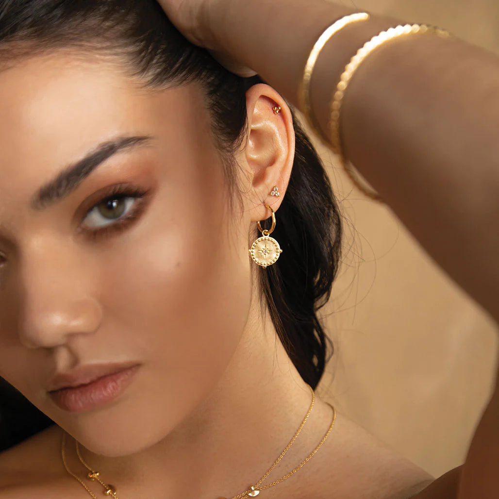 Small Hoop Earrings in Gold by Murkani