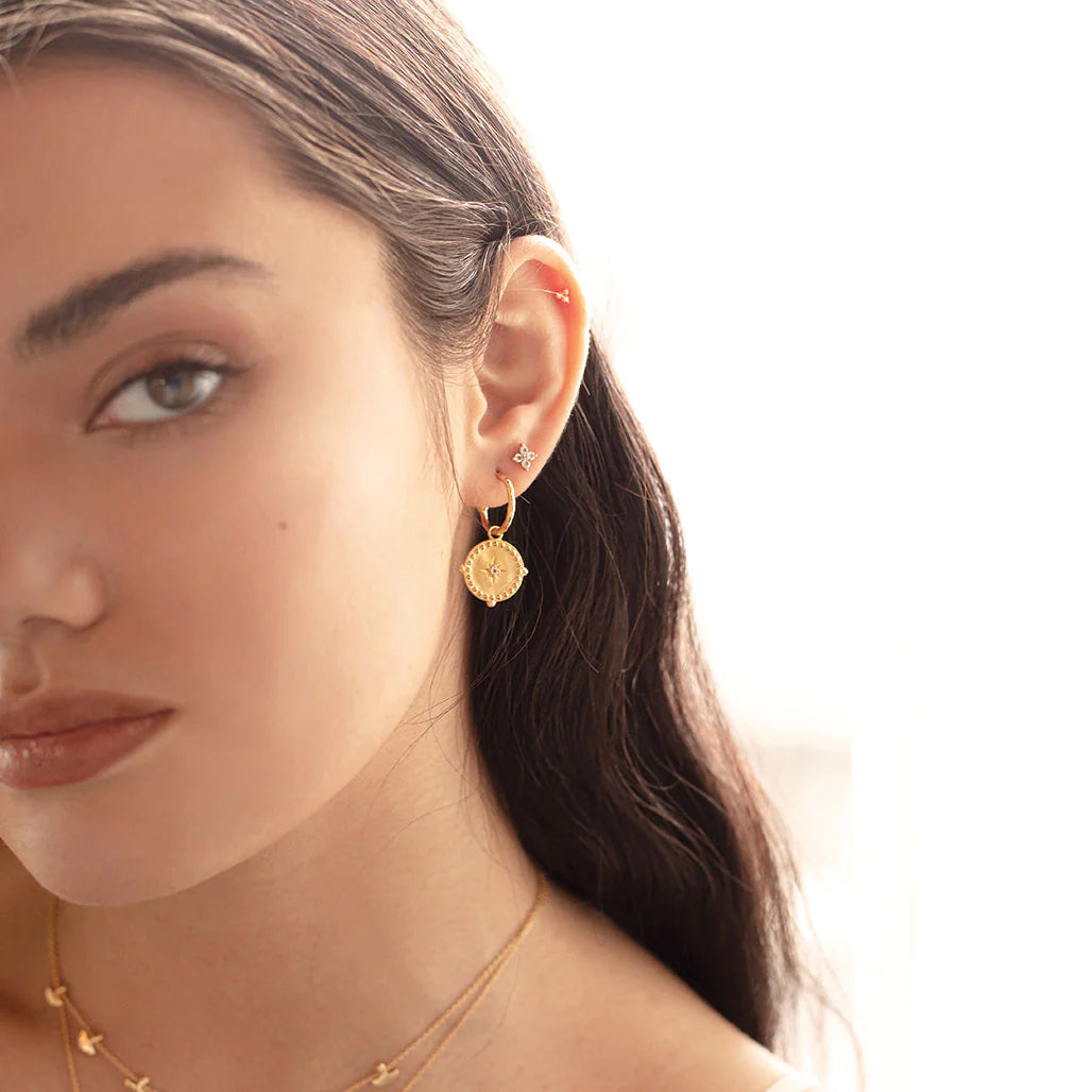 Small Hoop Earrings in Gold by Murkani