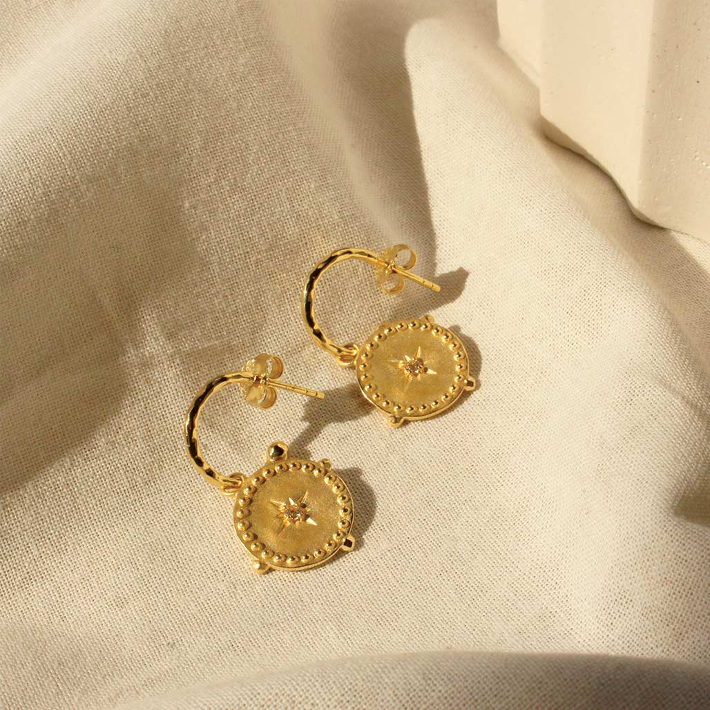 Small Hoop Earrings in Gold by Murkani